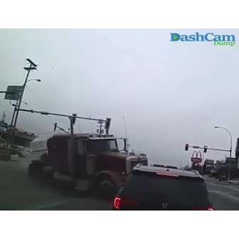Semi hits pick-up does a left turn and flips over