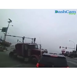 Semi hits pick-up does a left turn and flips over