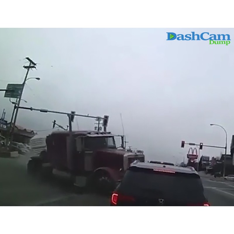 Semi hits pick-up does a left turn and flips over